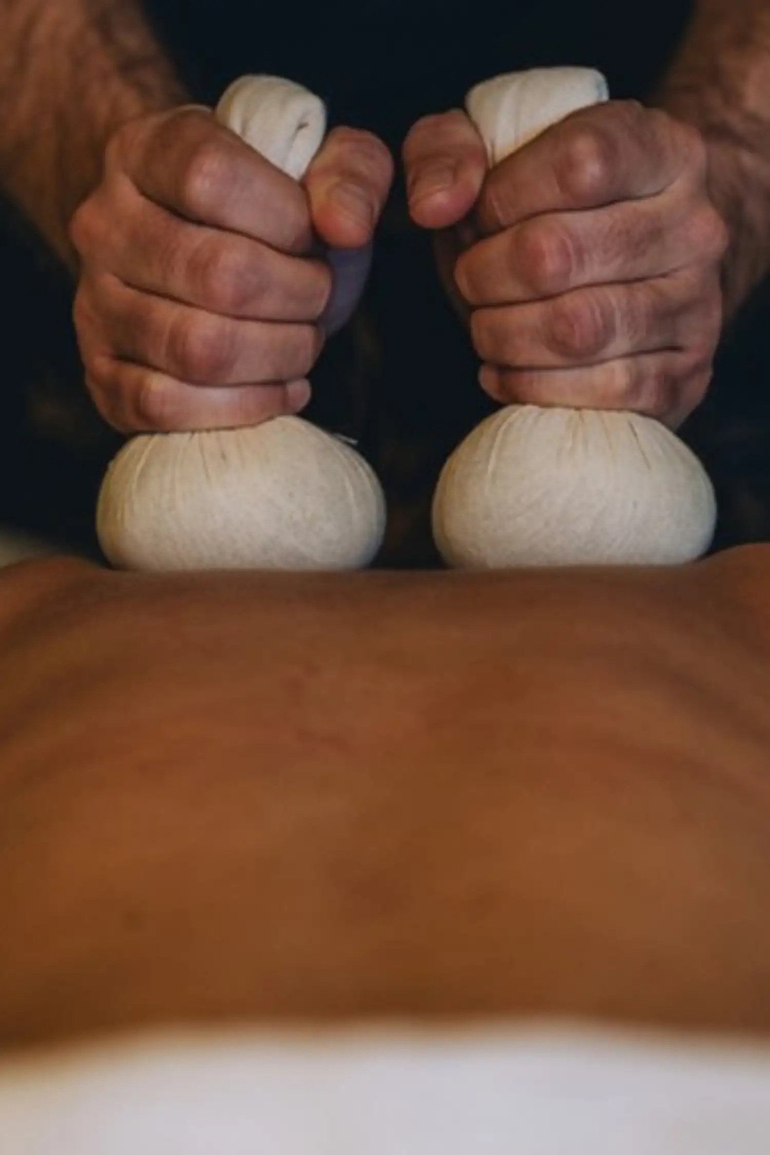 Herbal stamp massage