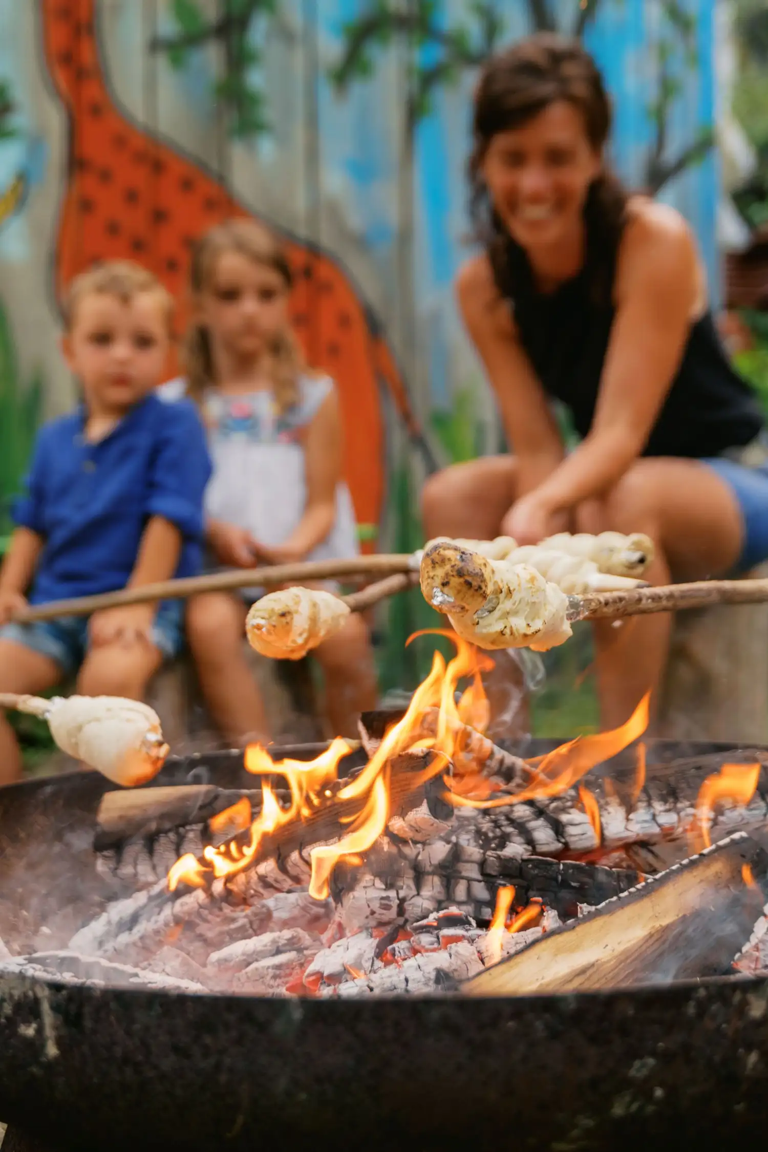 Bread on a stick and roasting marshmallows over the campfire